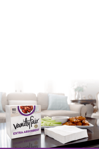 A package of Vanity Fair Extra Absorbent napkins sitting on a table.