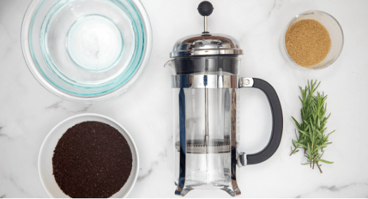 French Press, Coffee Grounds, Rosemary And Brown Sugar.