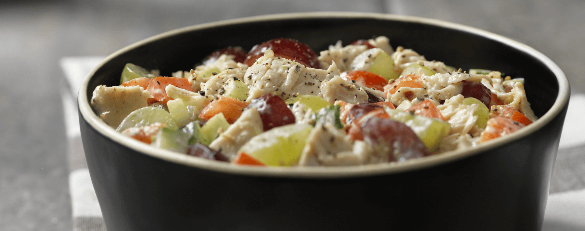 Chicken salad in a round bowl.