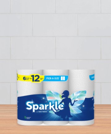 A package of Sparkle paper towels on a counter.