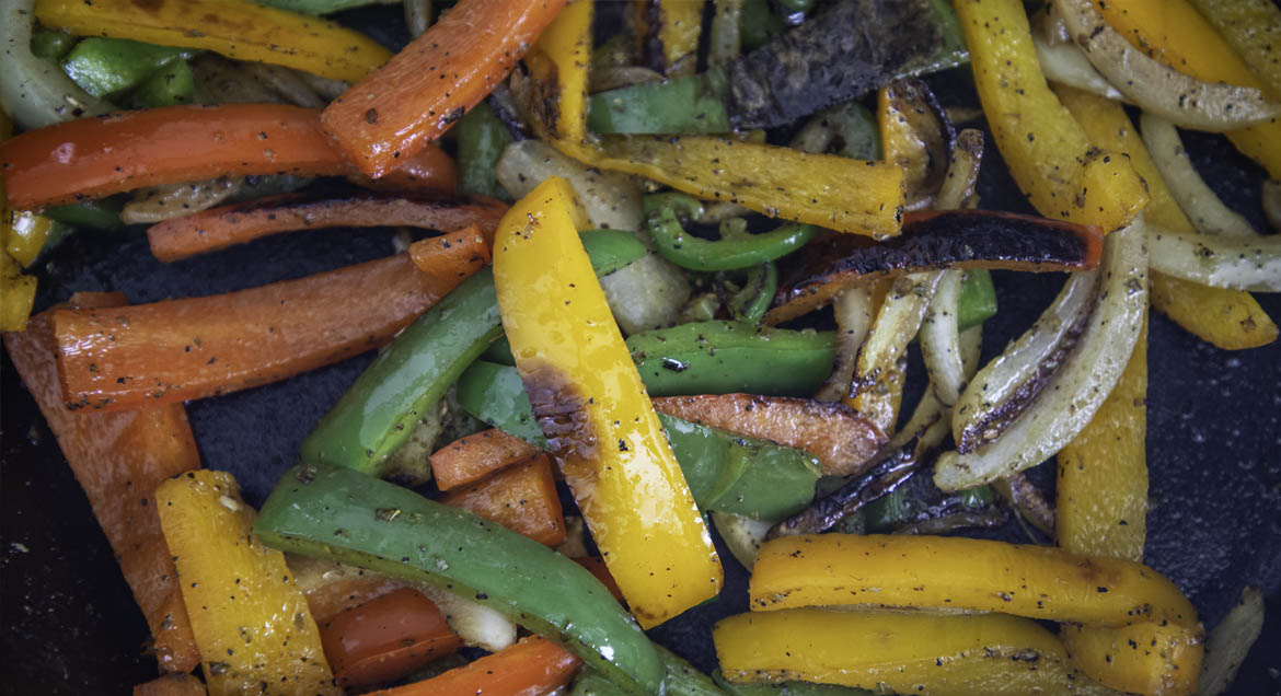 Grilled Peppers And Onions In Pan For Tofu Sofrita Taco Recipe.