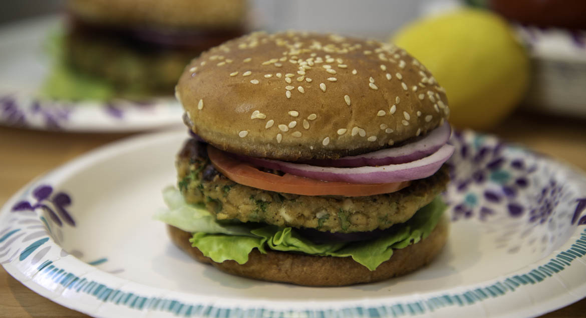 Salmon Burger On A Dixie Everyday Paper Plate.